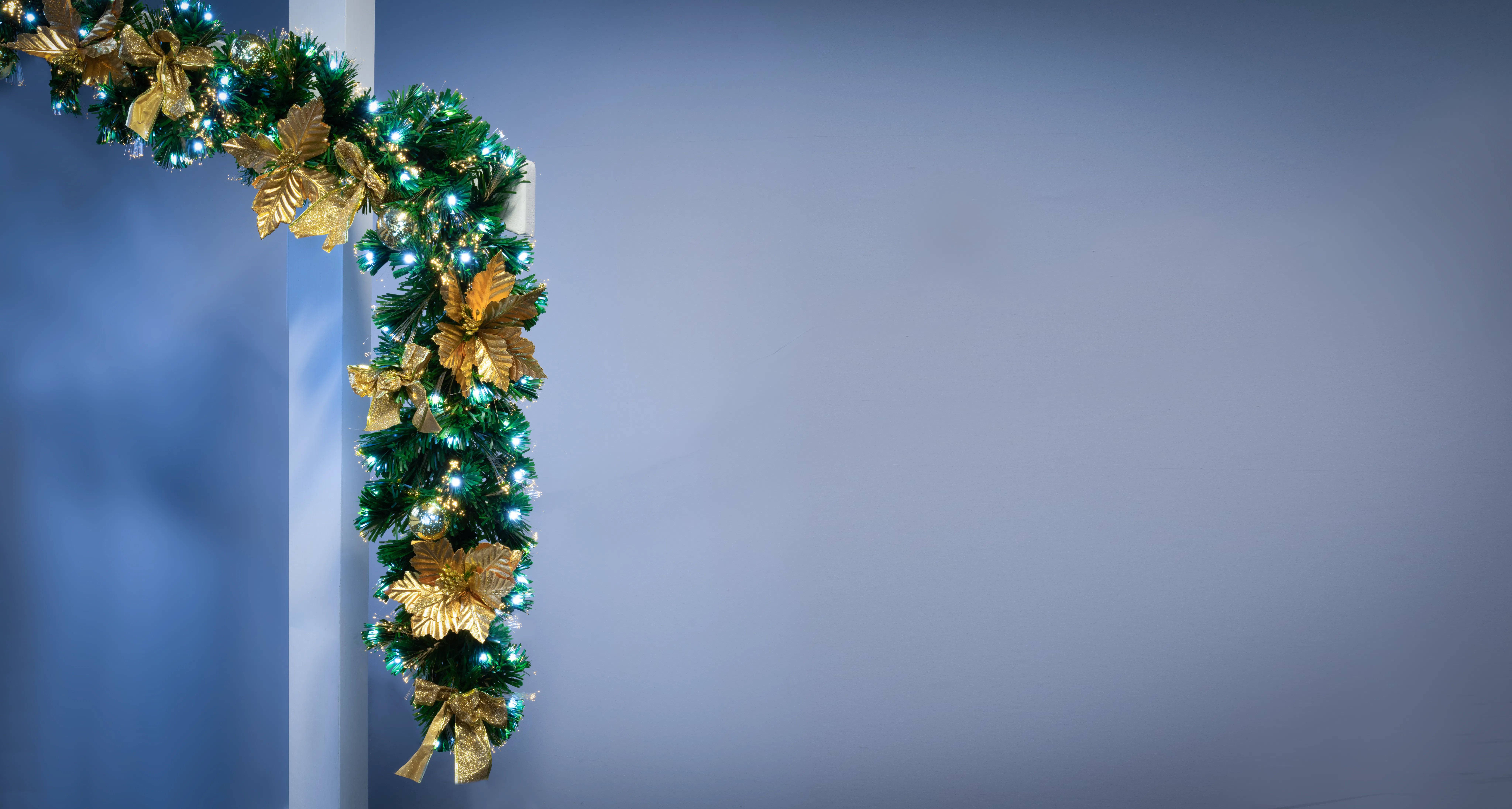 The 200cm Gilded Poinsettia Fir Fibre Optic Garland