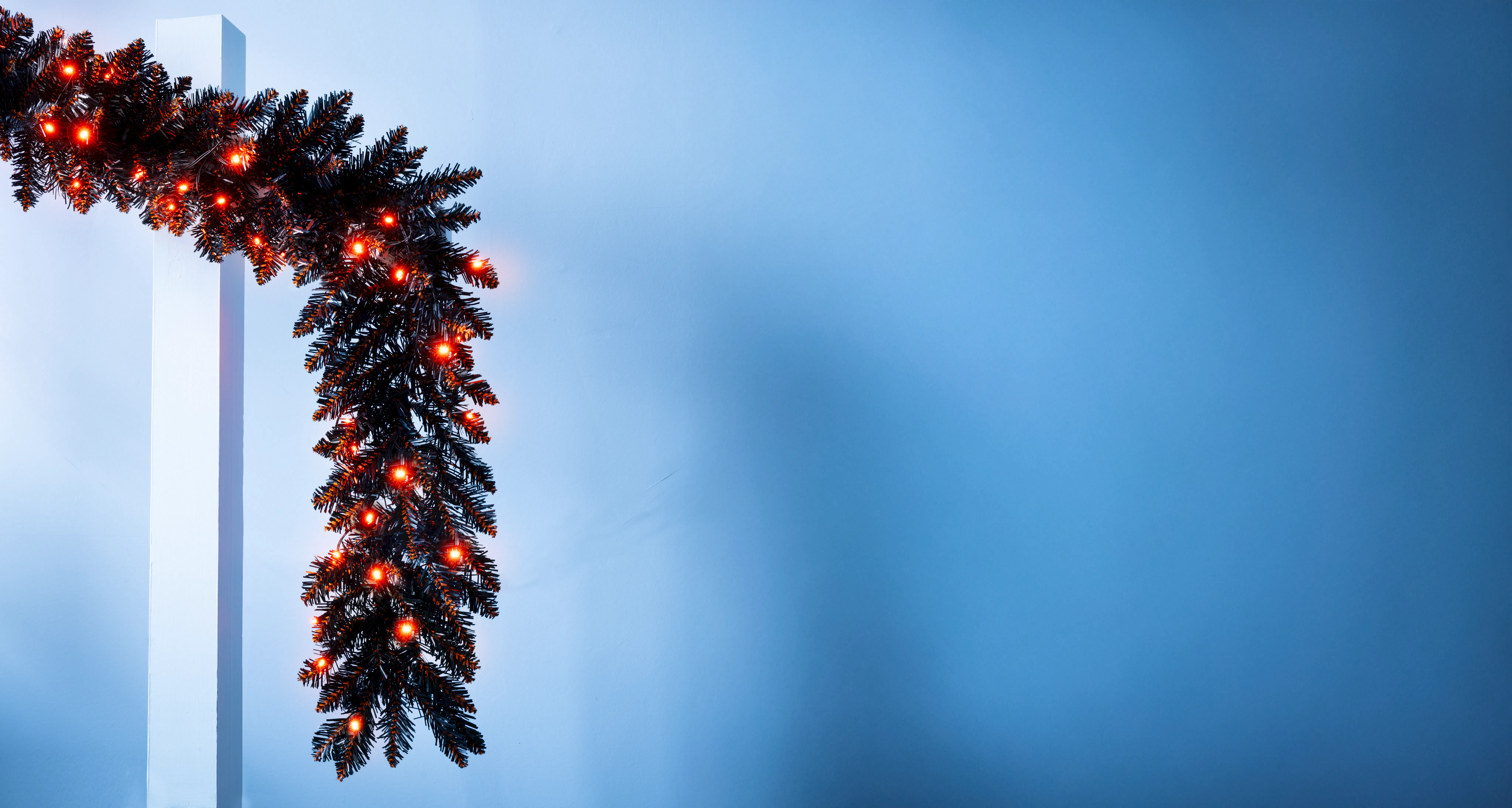 The 9ft Pre-lit Hallowshade Fir Garland - Orange Lights