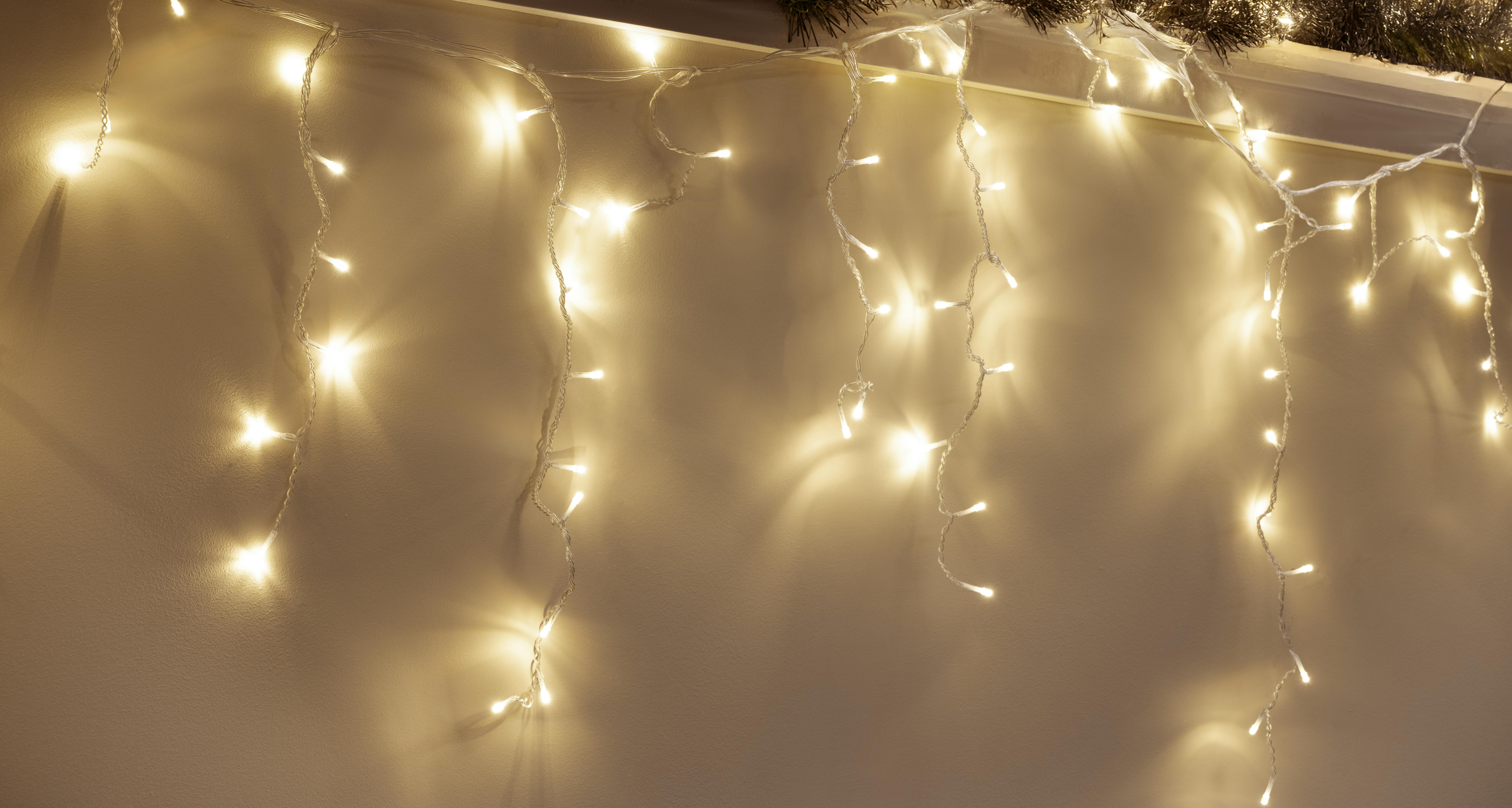 CTW Clear Cable 720 LED Snowing Icicle light set - Warm White w/ 48 gutter hooks