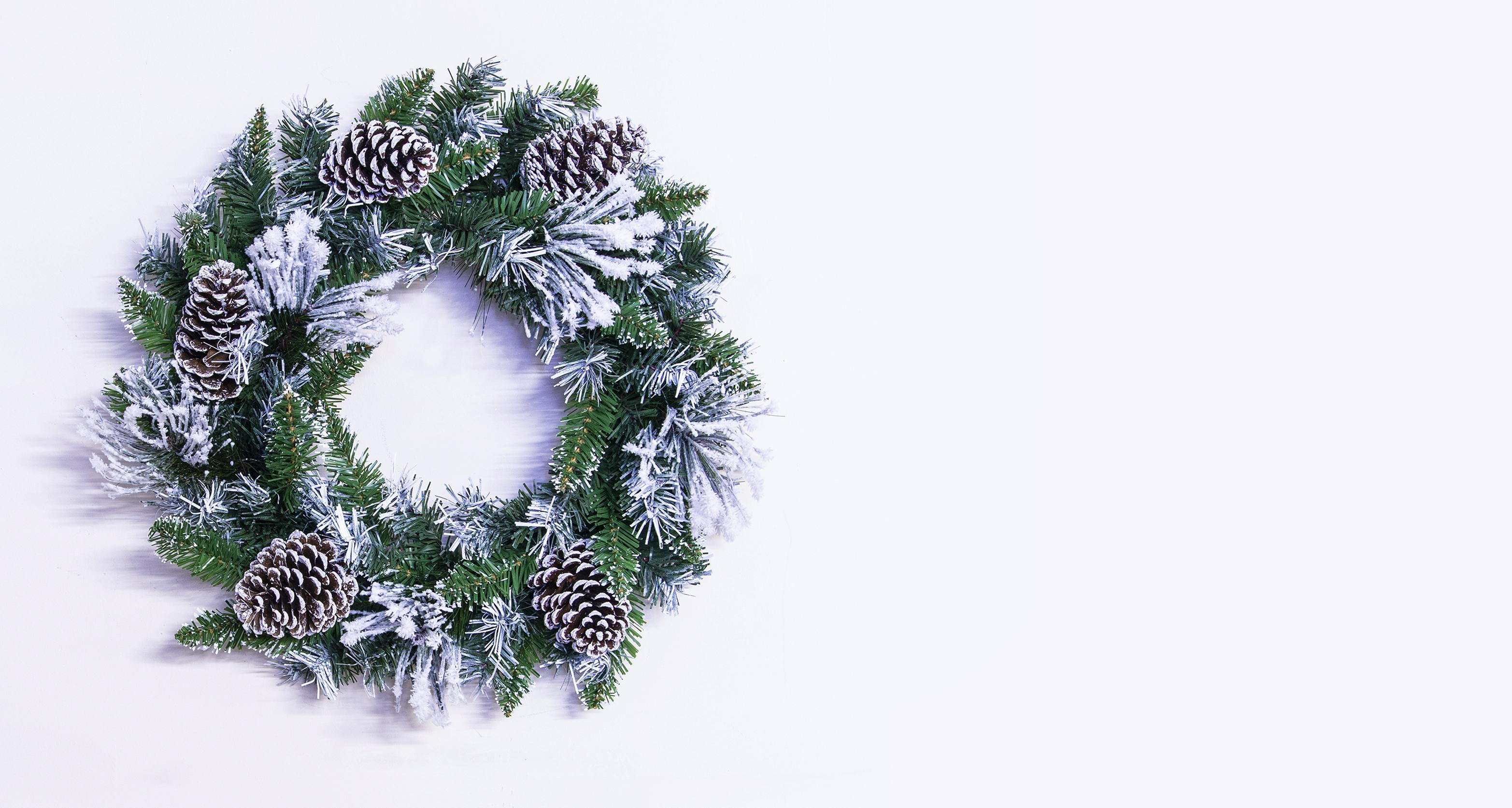 50cm Flocked Decorated Mixed Pine Wreath with Pine Cones